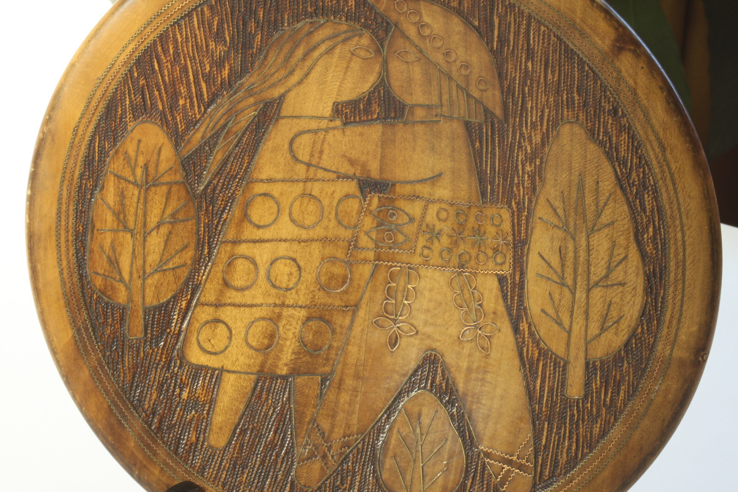 Scandinavian brass inlaid wooden plate with figures, 1960s.