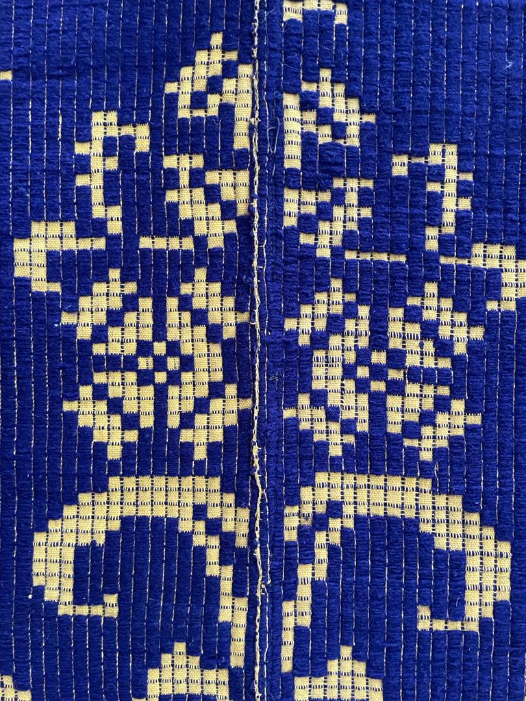Romanian floral rug handwoven in wool, purple and yellow background