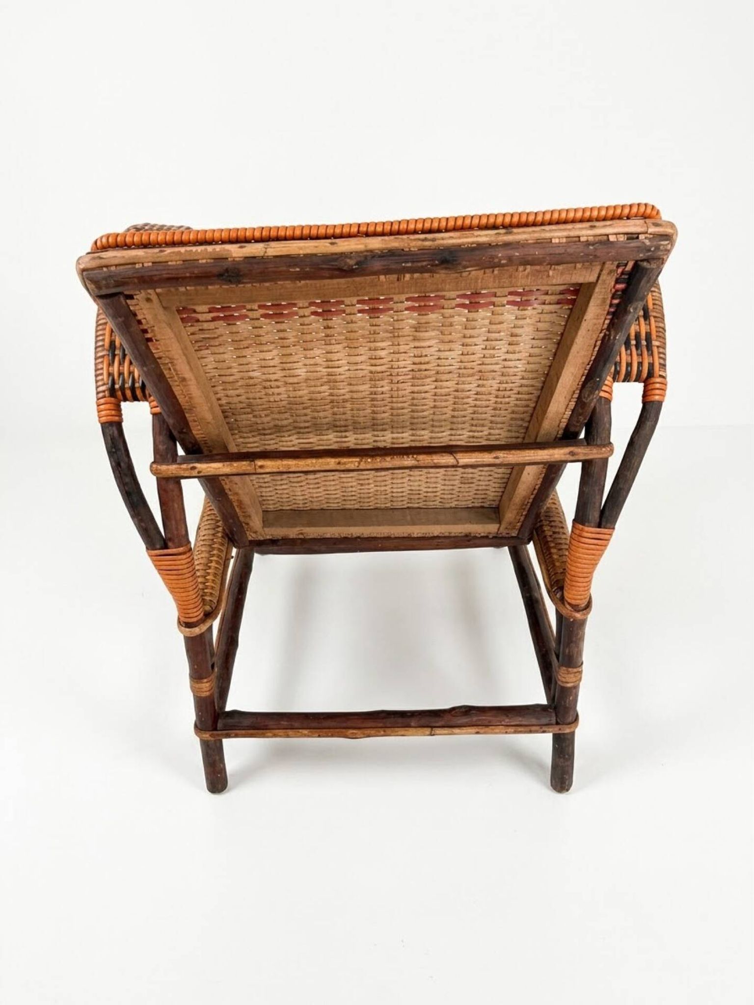 Vintage low armchair in rattan & two-tone weaving 1960s