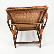 Vintage low armchair in rattan & two-tone weaving 1960s