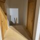 Large wooden dollhouse with miniature furniture