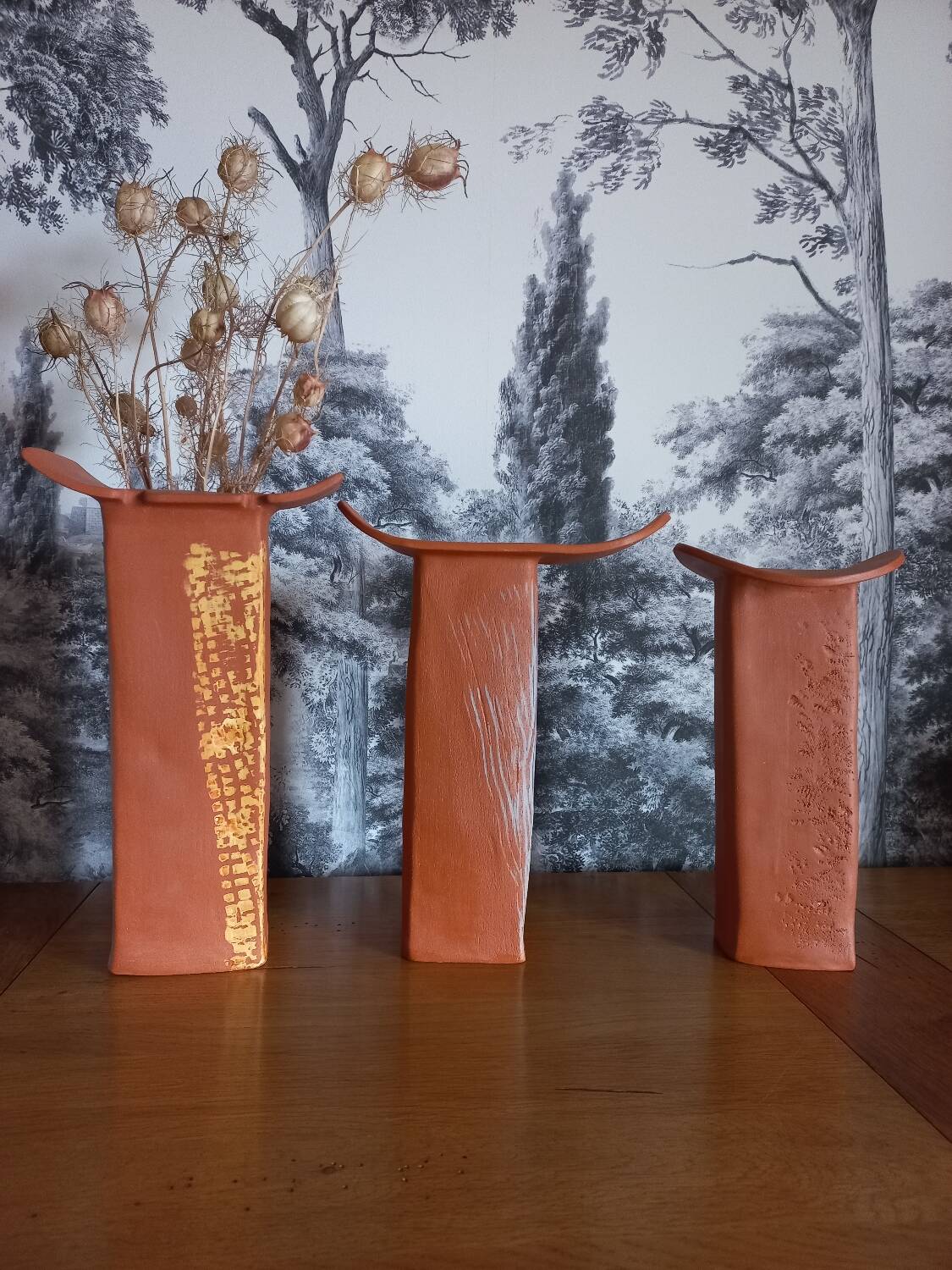 Trio of terracotta vases, unique pieces
