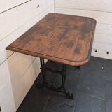 Bistro table with cast iron legs and oak top