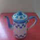 White enamelled sheet metal coffee maker with blue checkered Lustucru style stamped Duco
