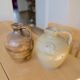 Duo of brown and cream ceramic jugs