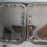 2 rectangular silver-plated metal dishes with an 80s pattern.