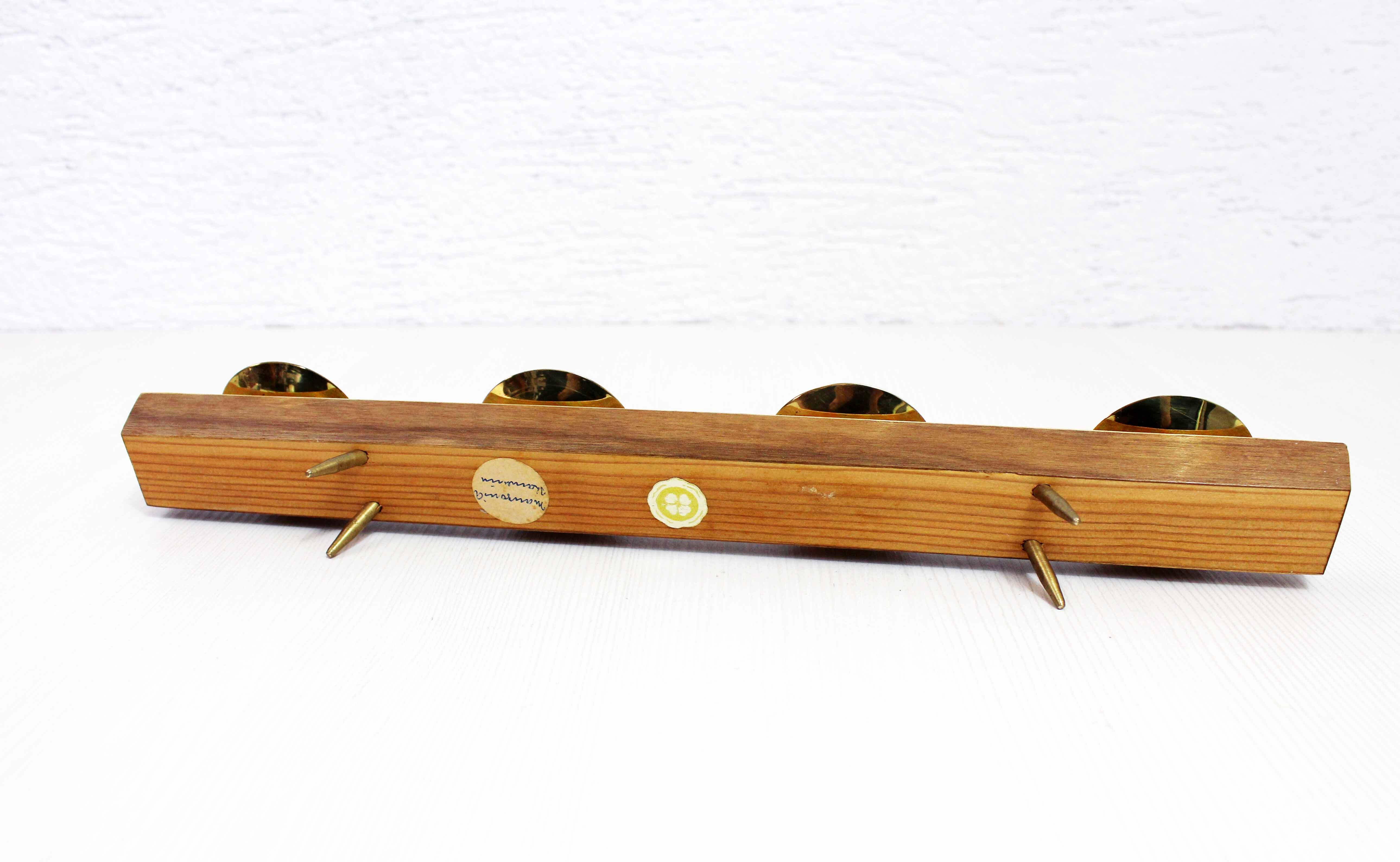 Wooden and brass candle holder