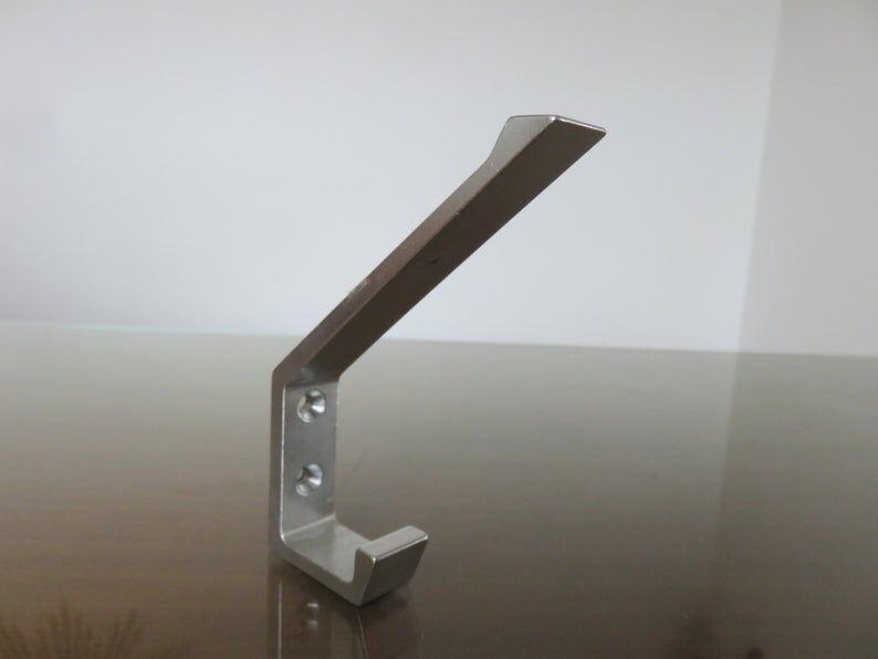 Series of 16 70s aluminium pads