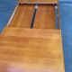 Scandinavian extendable dining table in honey-stained wood for 12 people 1990