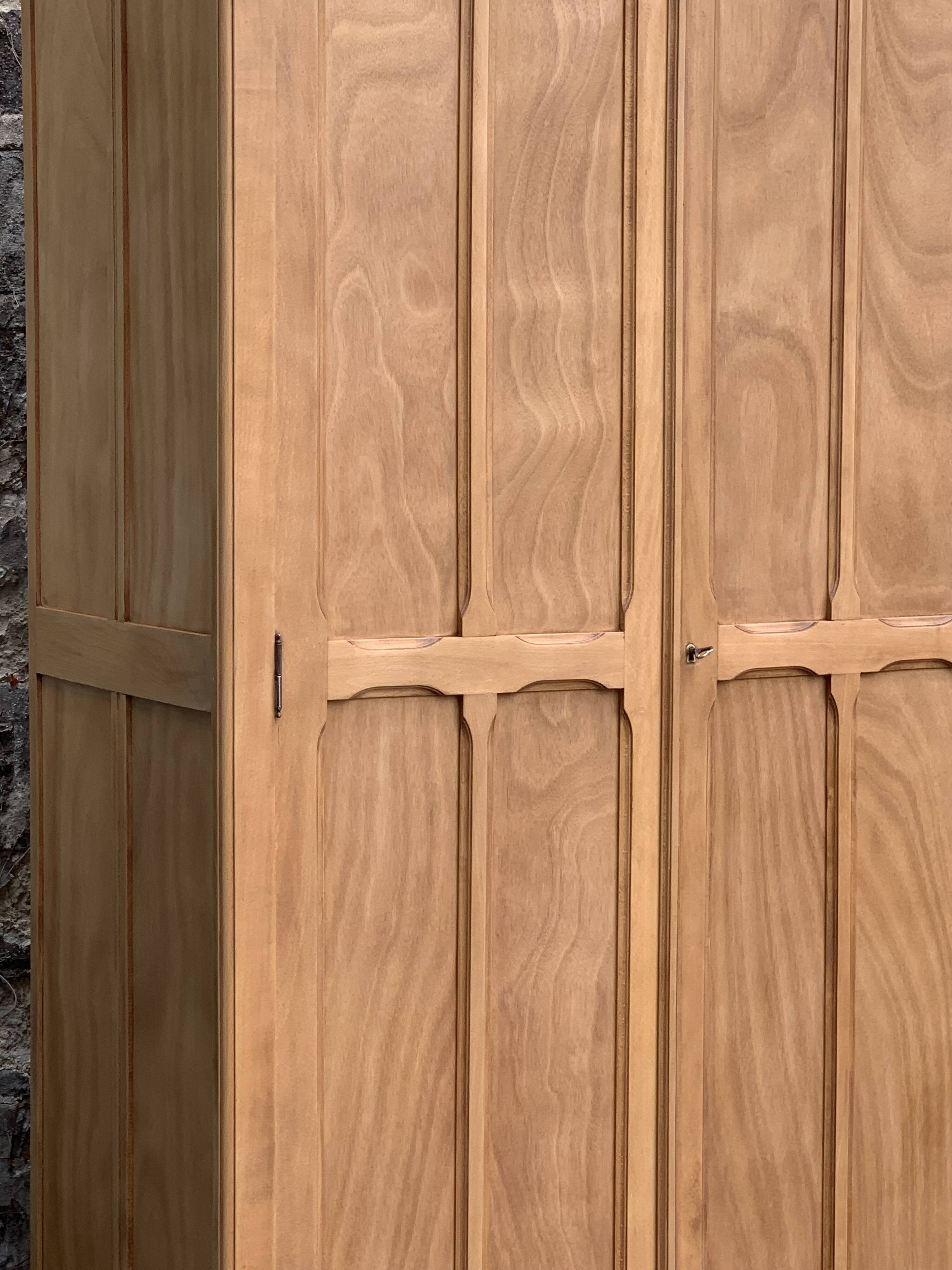 Parisian paneled cabinet in raw wood, 1940