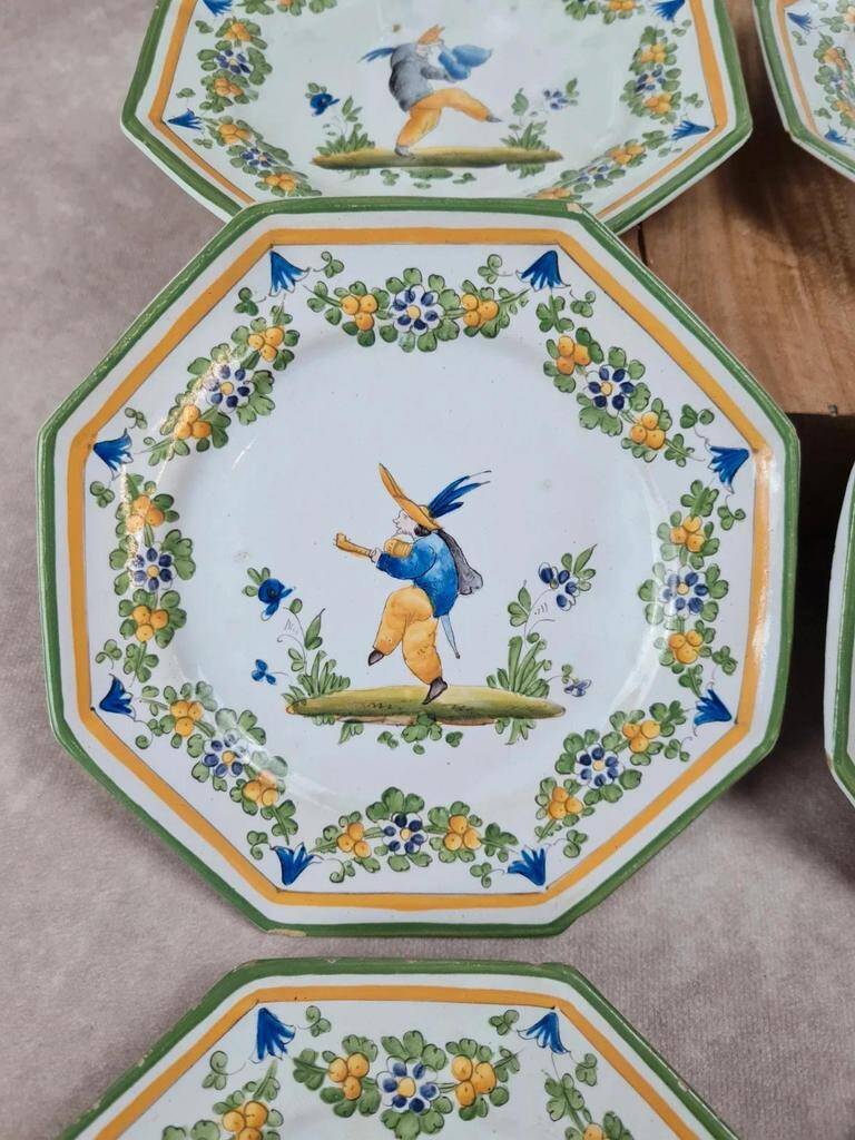 Set of 12 small antique plates by Alfred Renoleau, different designs.