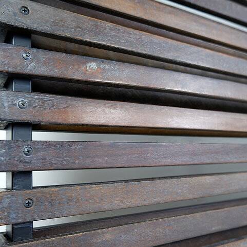 Slatted wood panel room divider or slatted coat rack with 10 mobile hooks