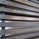 Slatted wood panel room divider or slatted coat rack with 10 mobile hooks