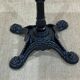 Modern bistro table, cast iron base, laminated top