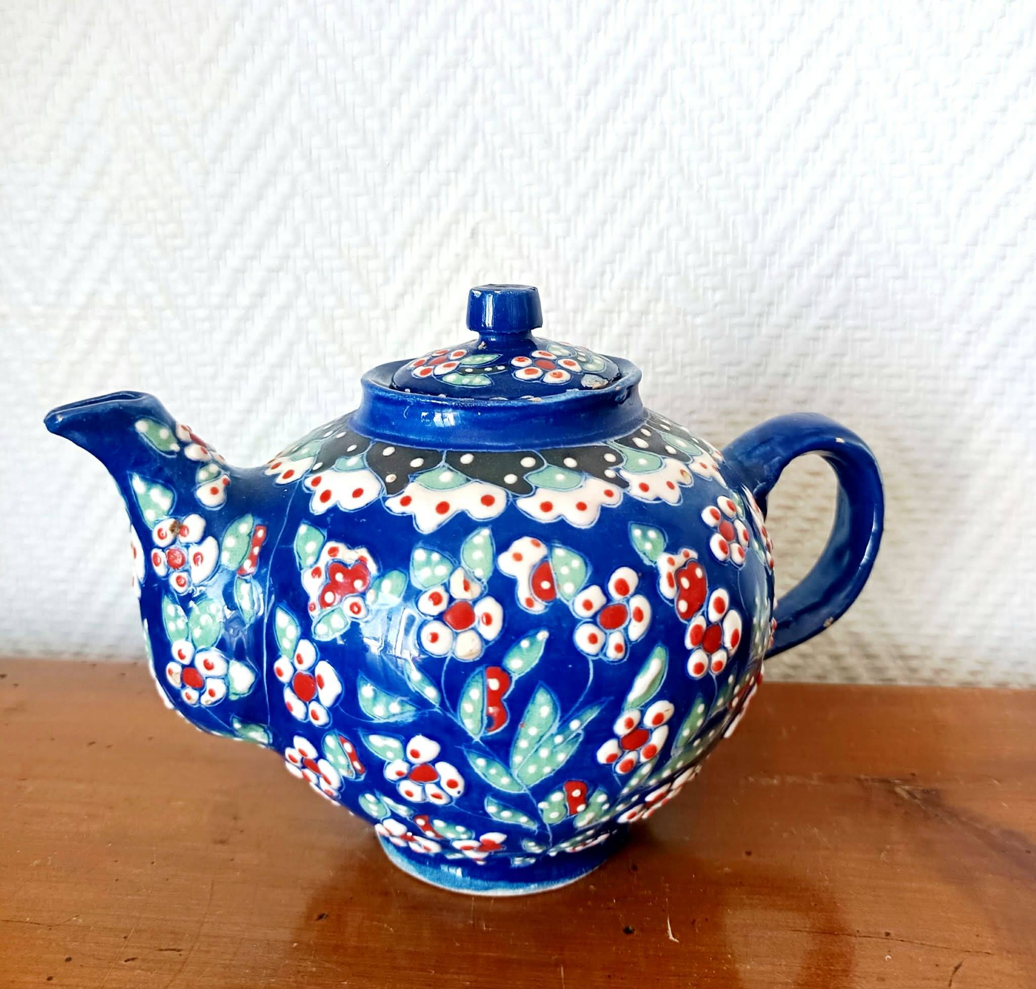Vintage enamel ceramic teapot