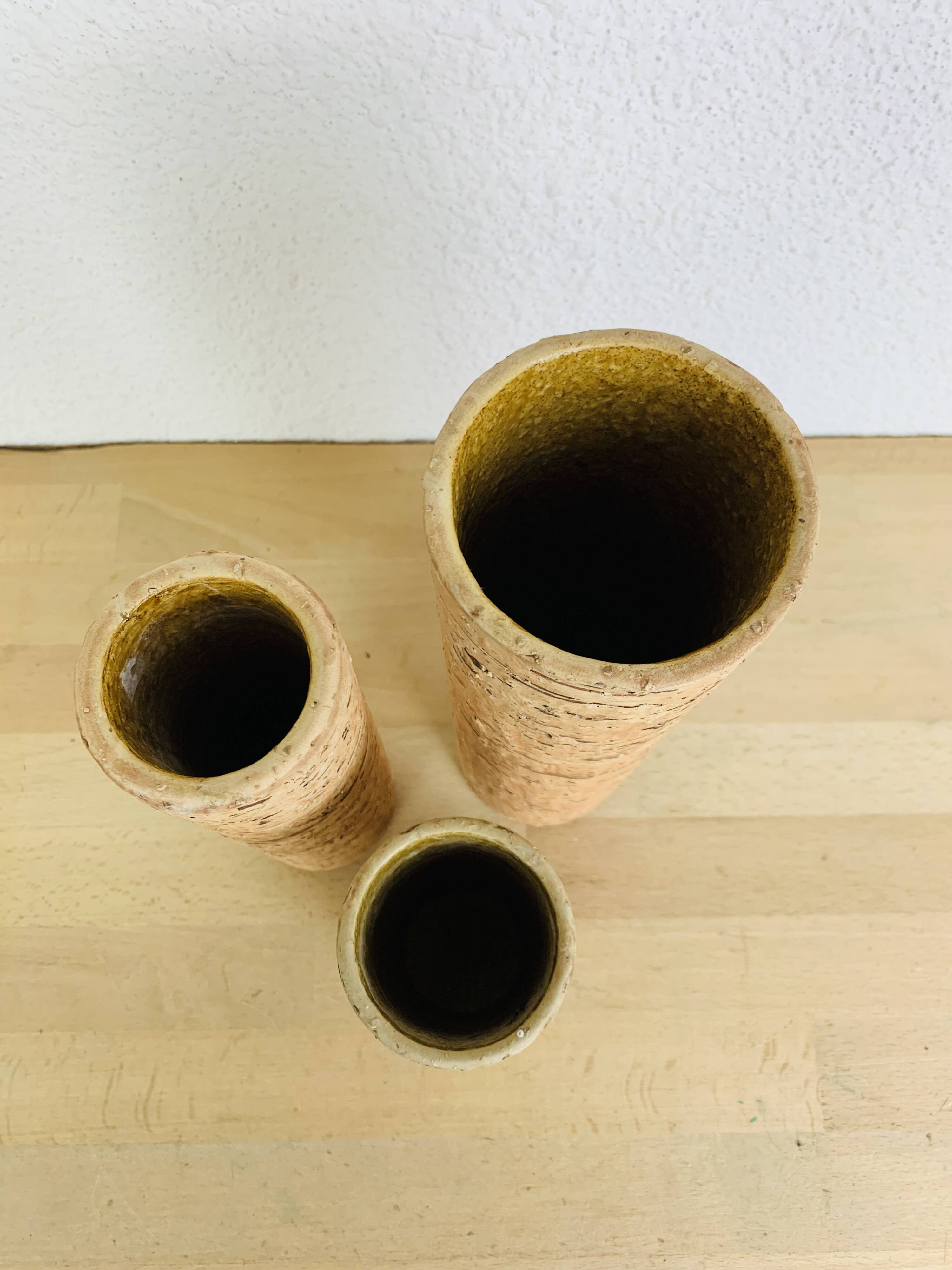 Three vintage stoneware roll vases