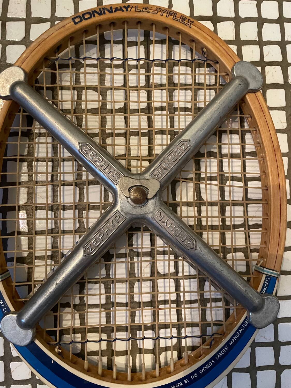 Vintage Zephir wooden tennis racket with metal protection