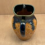 Slush pitcher signed "Mireille"