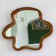 Miroir en osier de forme oranique