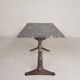 Bistro table with a marble top on a cast iron frame, 1930s.