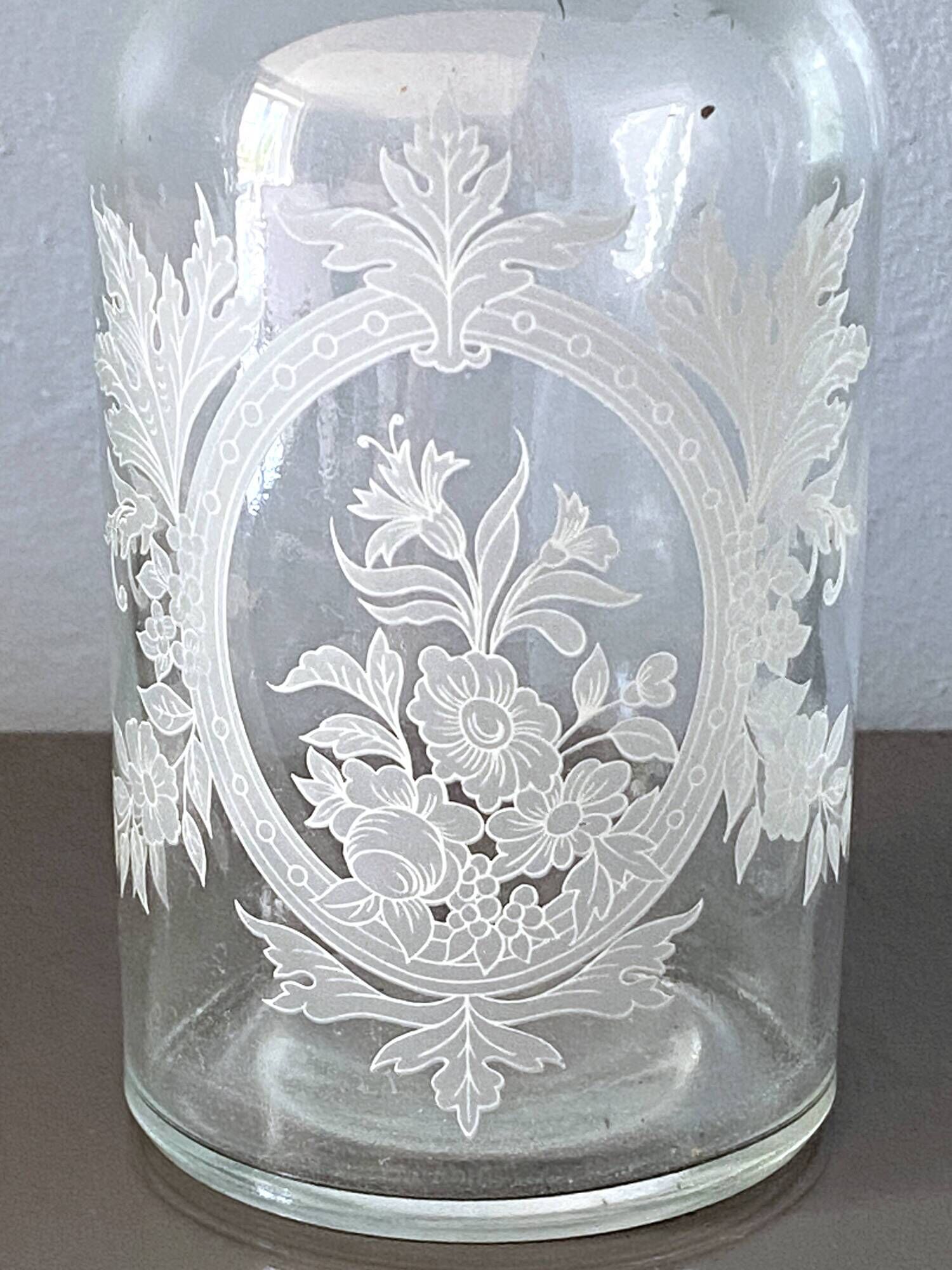 Pair of antique wheel-engraved glass bottles - good condition