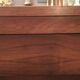 Commode en palissandre et métal brossé