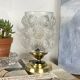 Antique globe table lamp in moulded transparent glass with a brass base.