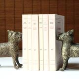 Book greenhouse, bronze leopards, 70s