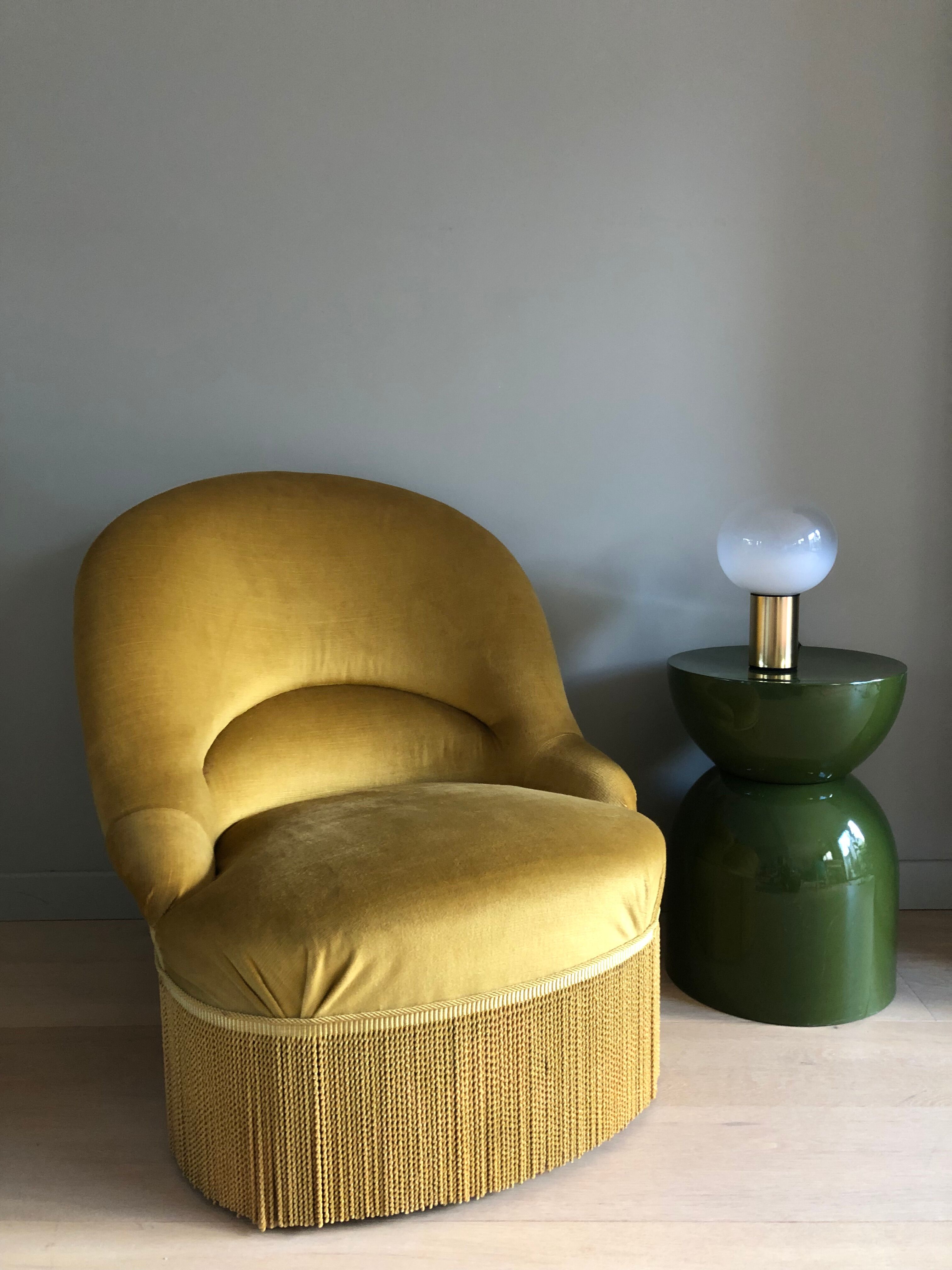 Fauteuil crapaud à franges vintage