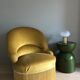 Fauteuil crapaud à franges vintage