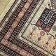 Tapis persan en laine beige 150x100