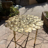 Carved brass coffee table with ginkgo decor