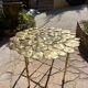 Carved brass coffee table with ginkgo decor