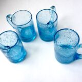 Four Biot glass mugs blue bubbled glass