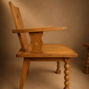 Pair of brutalist armchairs, oak, France, circa 1950.