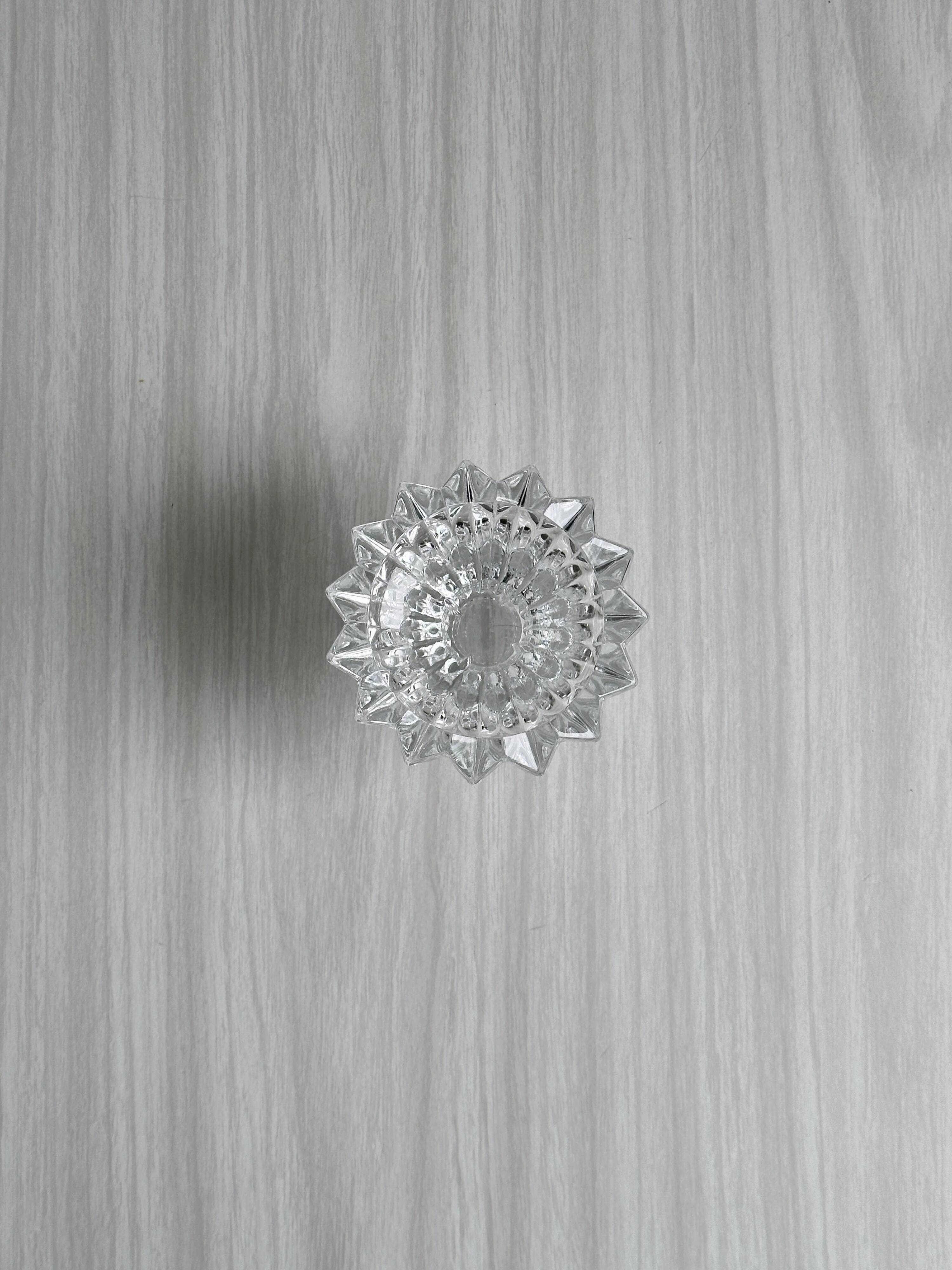 Elegant pair of faceted cut crystal candlesticks