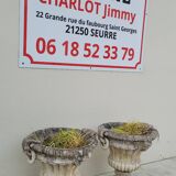 Pair of planter vases decorated with faces in reconstituted stone 1950s