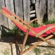 Former pliante long chair - wood foot rest - vintage red fabric