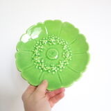 Plates Vallauris Alain Maunier, 1970, in the shape of a flower, in green earthenware