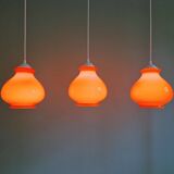 Trio of vintage orange opaline pendant lights, 1960-70