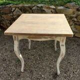 Antique square table with curved legs