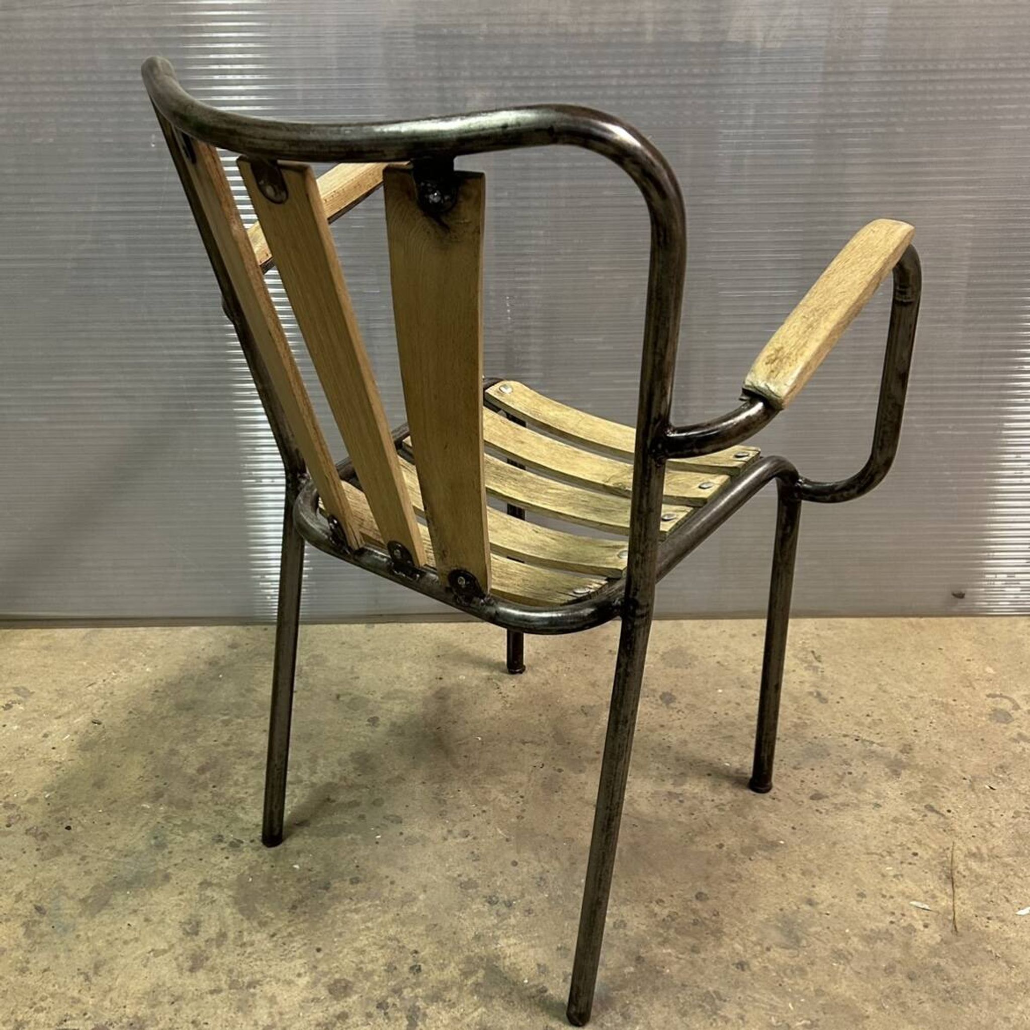 Industrial armchair in metal and wood