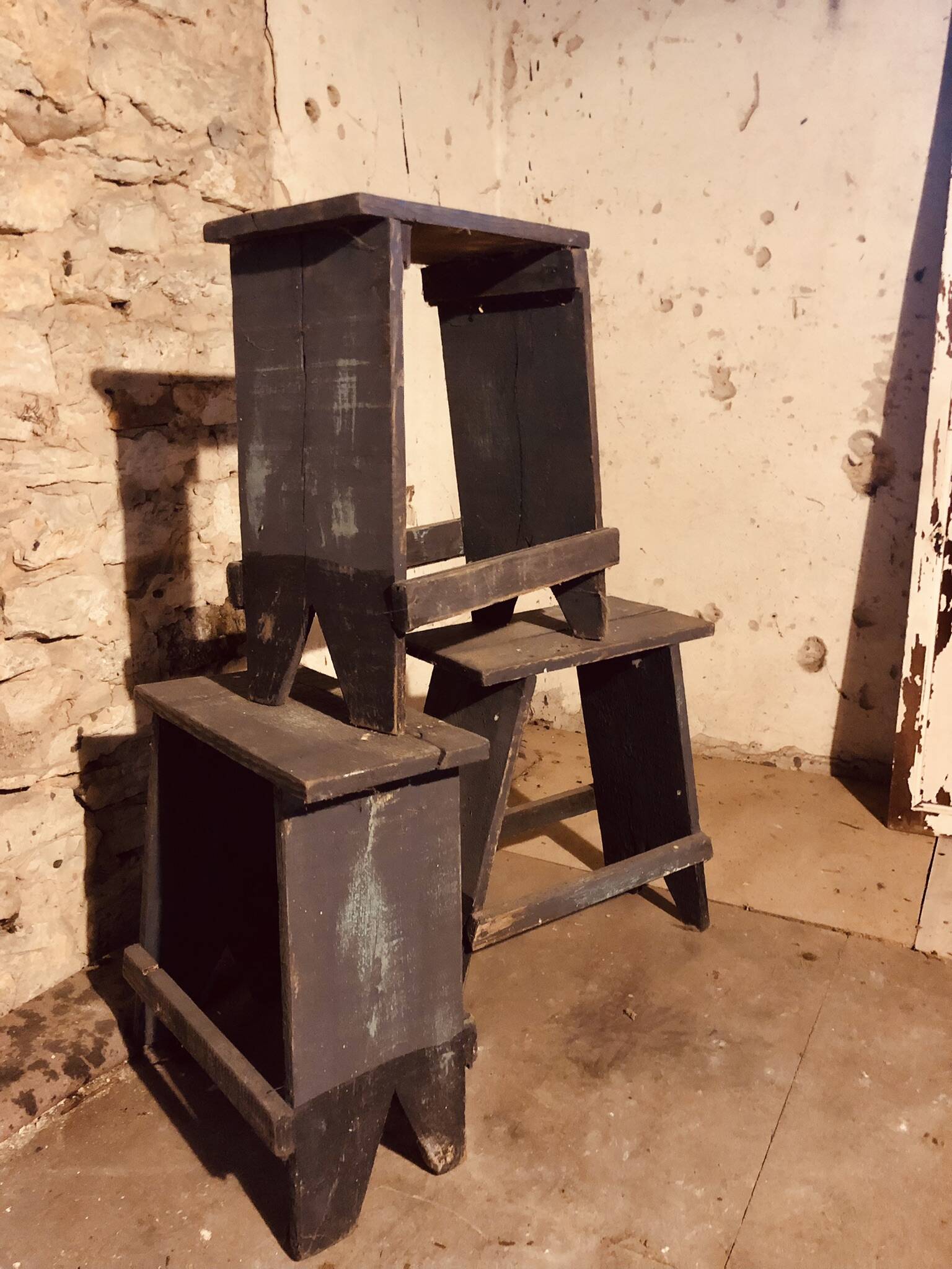 3 low blue-grey stools