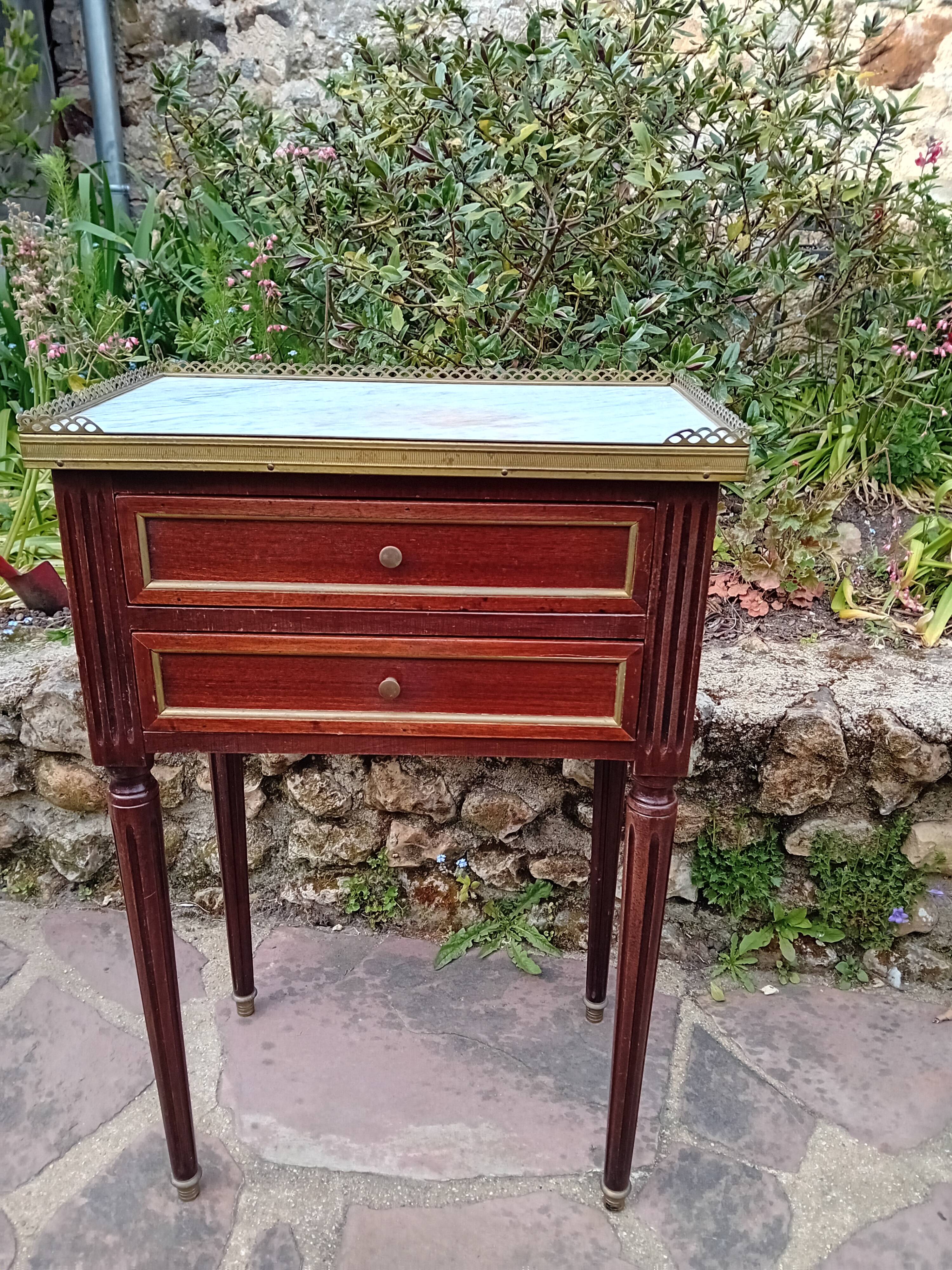 Pair of Louis XVI bedside tables.