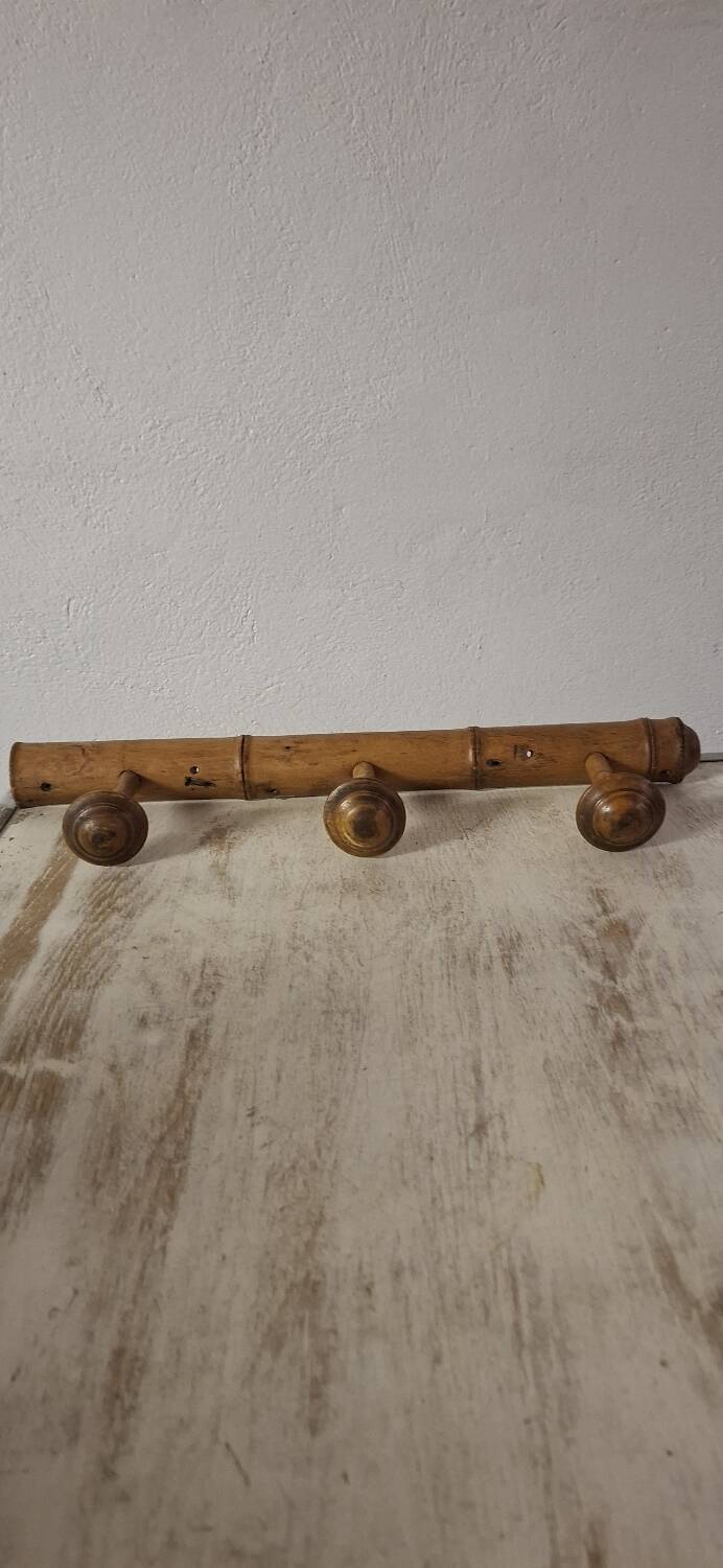 Turned wooden coat rack.