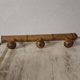 Turned wooden coat rack.