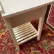 Wooden bedside table painted white