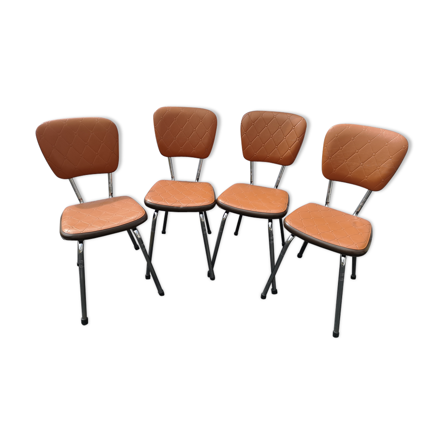 4 chairs in brown vinyl