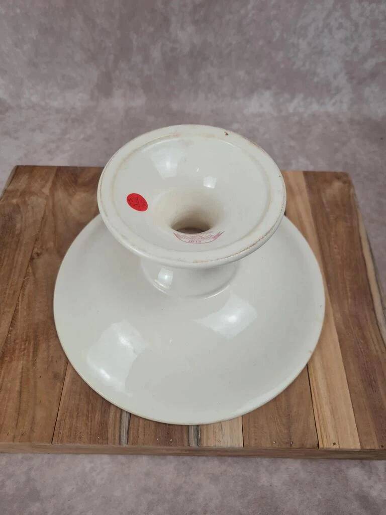 Large footed compote Gien model Iris with red floral decoration.
