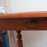 Round table with folding sides